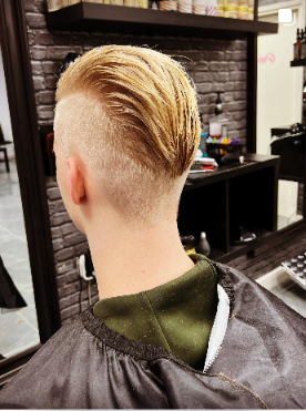 Blonde undercut met slick back styling bij Kapsalon Nijkerk